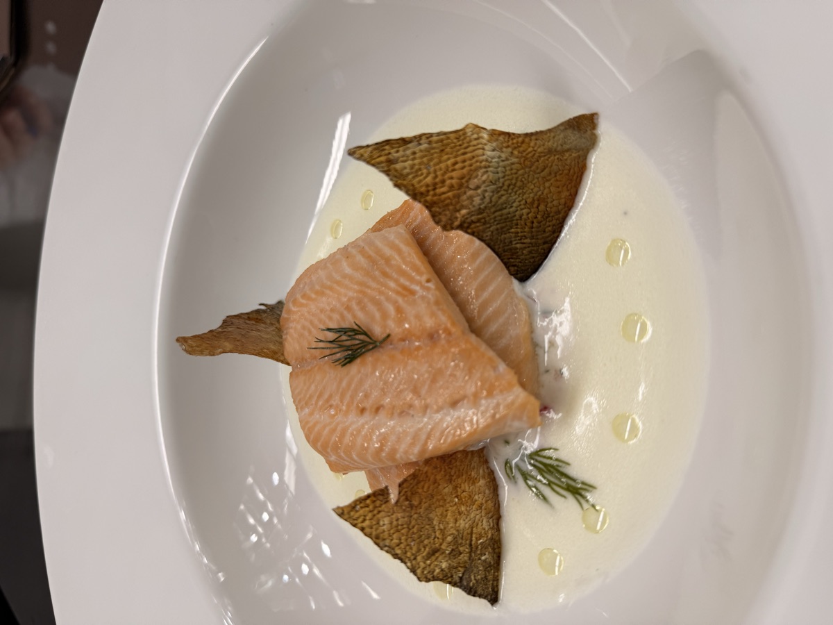 Poached salmon with dill cream and crispy skin